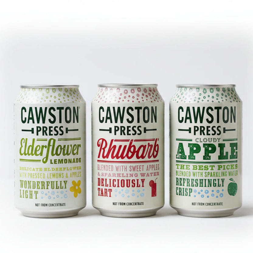 Three Cawston Press cans with different flavors on a white background