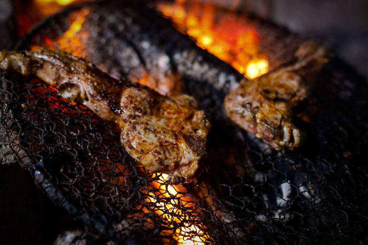 Lamb chops over glowing embers